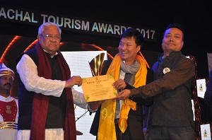 The Governor of Arunachal Pradesh Shri PB Acharya presenting awards on the   occasion of State Tourism Award function at IG Park Itanagar on 31st January2017.